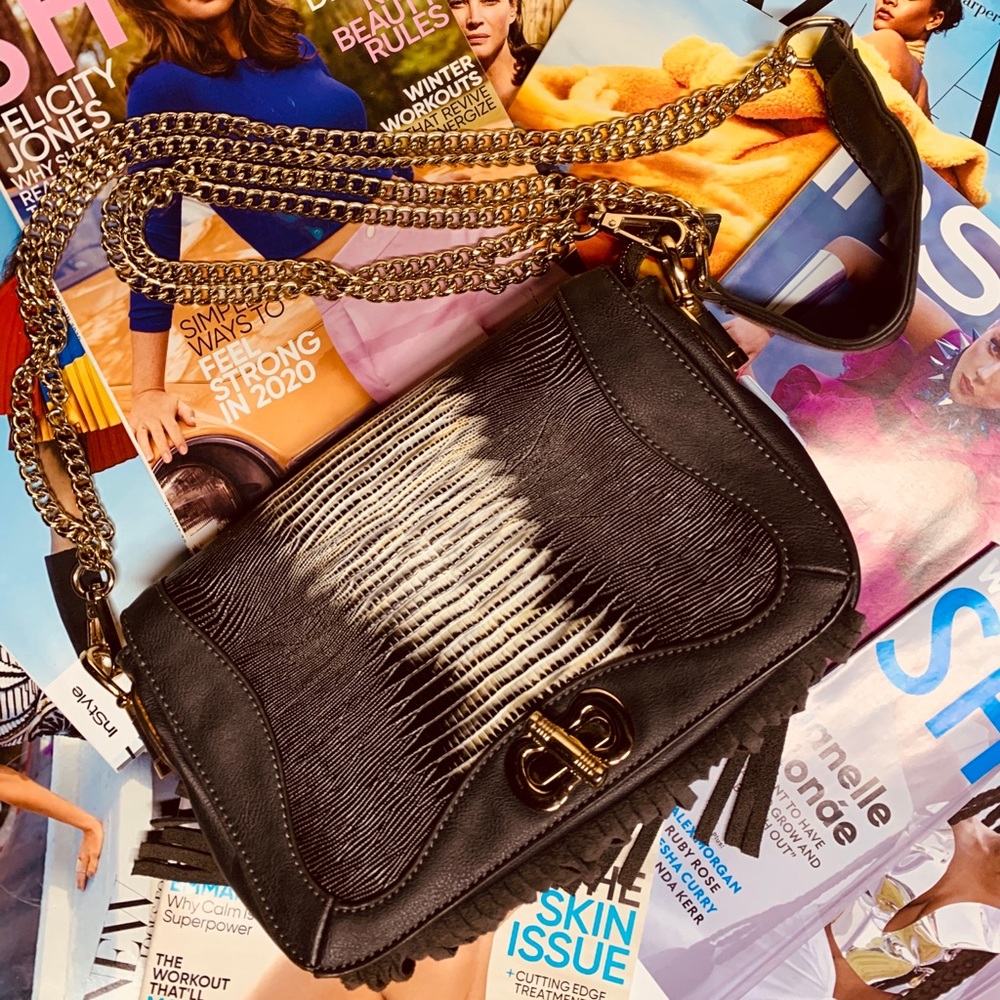 BEBE FRINGE BAG UP FOR GRABS!